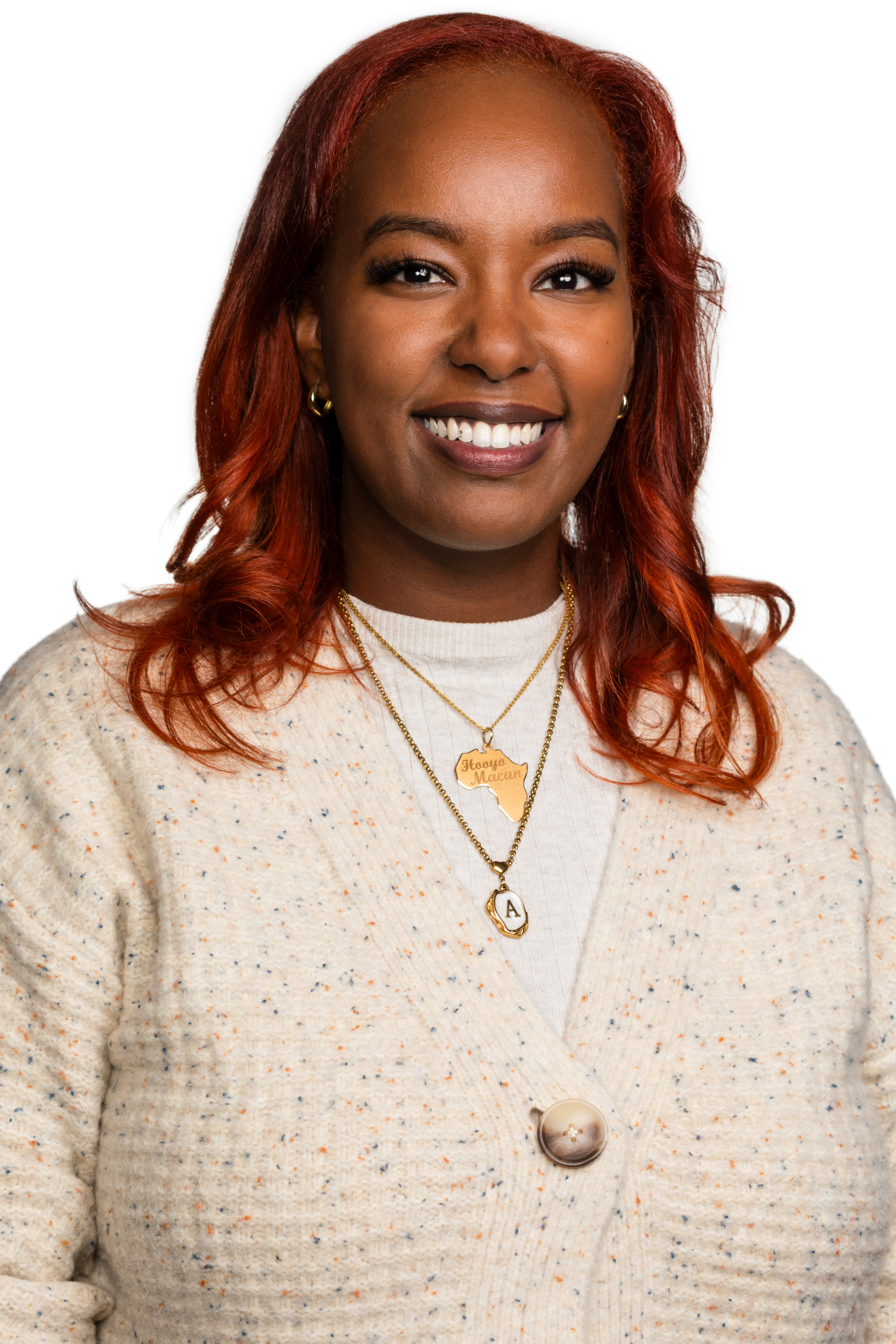 Picture of Asha Hassan in a white sweater in front of a white background